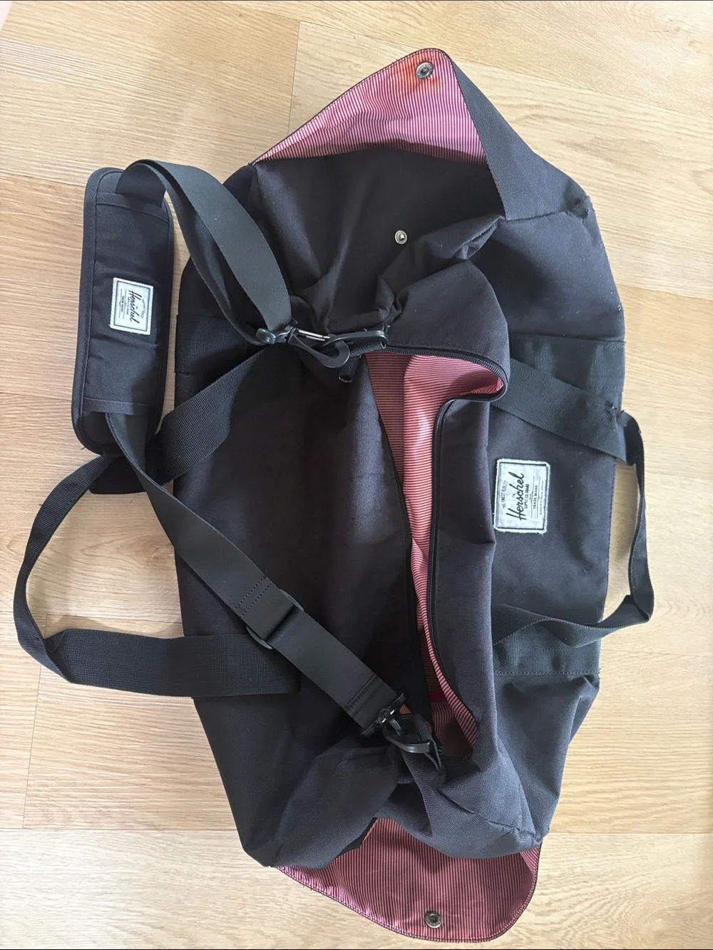 Herschel Supply Company Black Duffel with Burgundy Interior Trim